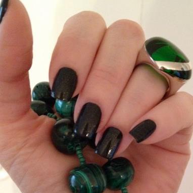 Nail it with this dark green OPI manicure